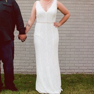 Woman’s size 8 ivory lace wedding dress